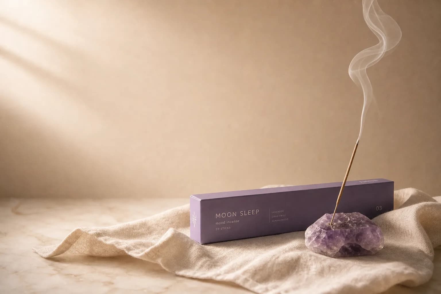 Candle and incense on a wooden tray